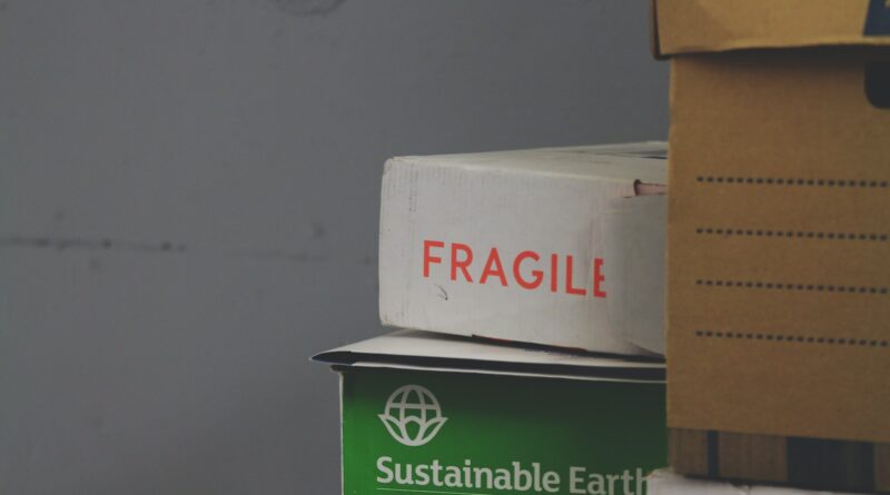white and red Fragile labeled box